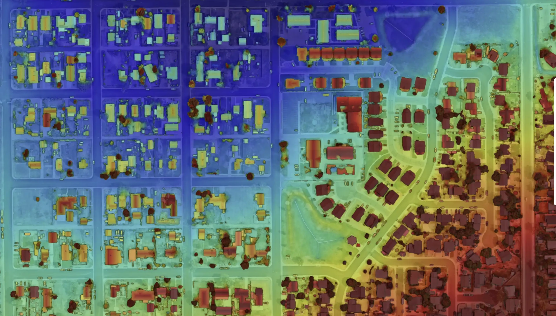 Color-coded elevation heat map of a residential neighborhood showing terrain highs and lows